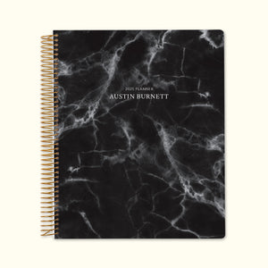 
                  
                    8.5x11 monthly planner with a sleek black marble cover, featuring a sophisticated aesthetic, durable paper, and spacious monthly layouts for effortless planning.
                  
                