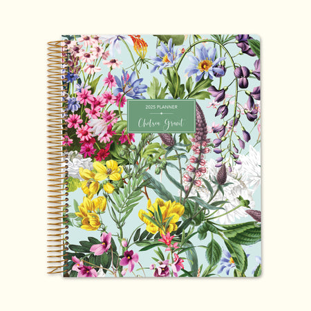 8.5x11 monthly planner with a vibrant colorful florals green cover, blending lush botanical elements with smooth writing paper and spacious monthly pages.