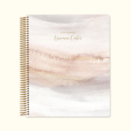8.5x11 monthly planner with a calming neutral watercolor gradient cover, featuring delicate tones, smooth writing paper, and functional monthly spreads for easy planning.