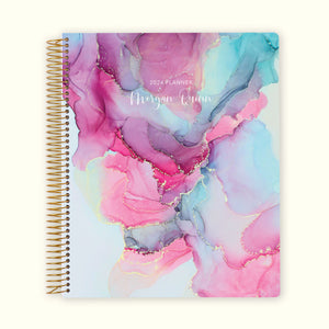 
                  
                    8.5x11 monthly planner with a fresh pink blue abstract ink cover, featuring expressive brushstrokes, smooth writing paper, and spacious monthly planning spreads.
                  
                