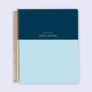 
                  
                    8.5×11 student planner with a Blue Navy Color Block cover and gold coil binding.
                  
                