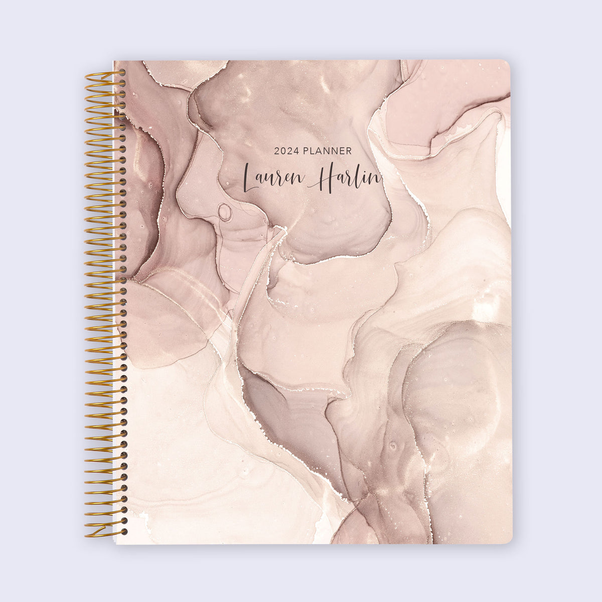 8.5×11 student planner with a Neutral Abstract Ink cover and gold coil binding.