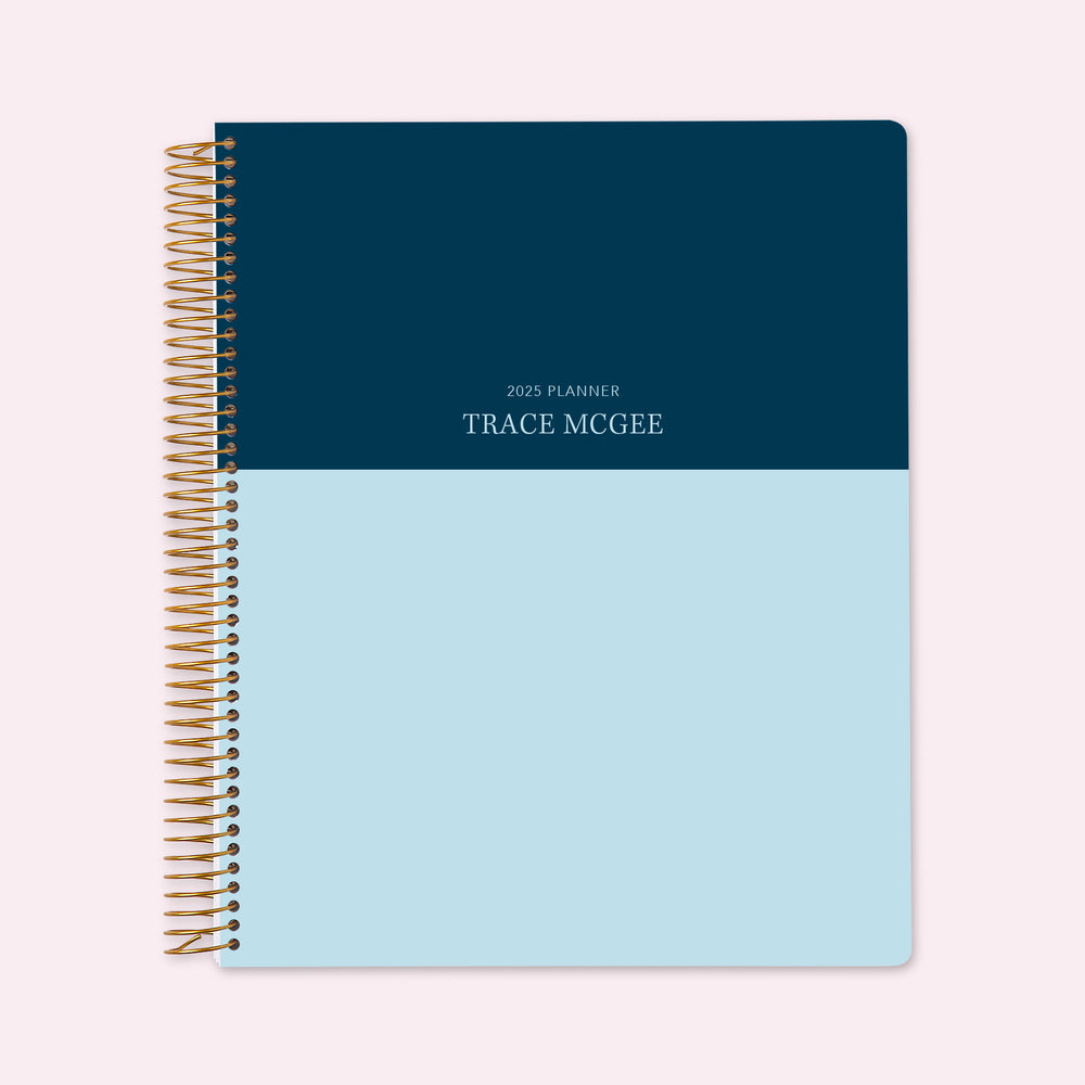 8.5x11 teacher planner with a classic blue navy color block cover, blending bold contrast with high-quality paper and structured planning sections for effortless organization.
