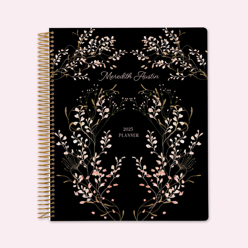 8.5x11 teacher planner with a classic flower frame pink cover, blending soft botanical tones with smooth writing paper and structured planning sections.