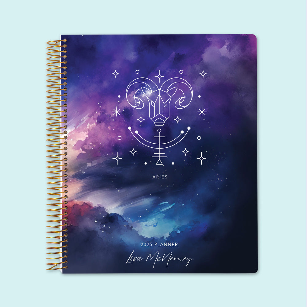 Weekly planner in 8.5x11 with an Aries Zodiac cover, featuring a bold space-inspired design in rich purples and blues with structured weekly layouts.