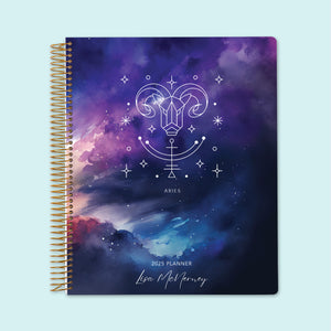 
                  
                    Weekly planner in 8.5x11 with an Aries Zodiac cover, featuring a bold space-inspired design in rich purples and blues with structured weekly layouts.
                  
                