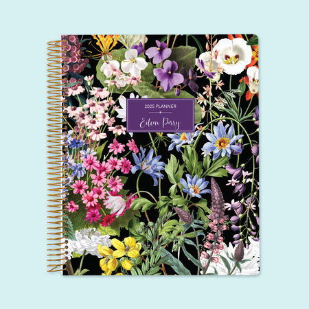 8.5x11 planner with a Colorful Florals Black cover, featuring bold floral artistry, smooth pages, and clear weekly planning sections for productivity.