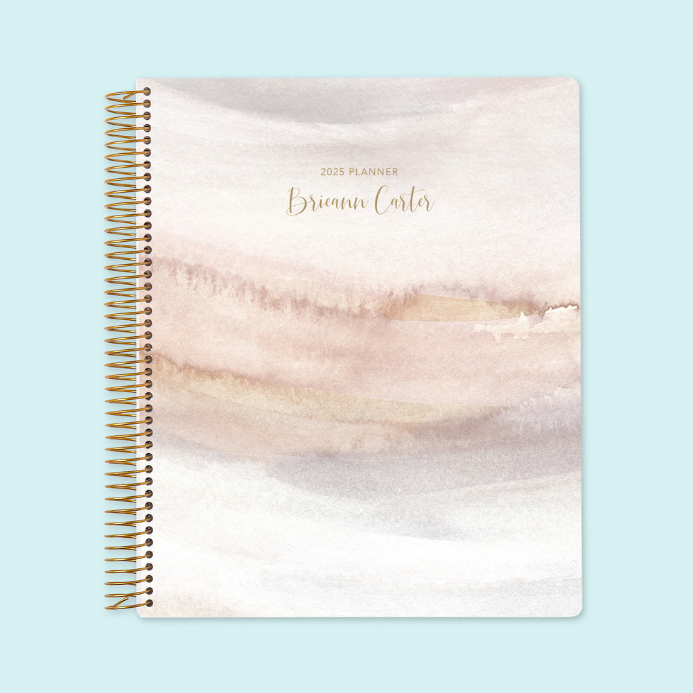 8.5x11 weekly planner with a soft neutral watercolor gradient cover, blending subtle tones with durable paper and spacious weekly layouts for balanced organization.