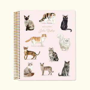
                  
                    Spacious 8.5x11 monthly planner with playful cat design – features 15 popular breeds on the cover.
                  
                