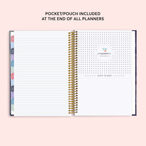 
                  
                    Lined notes page beside the planner's back pocket.
                  
                