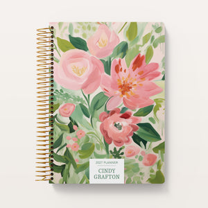 
                  
                    Blossom Dreams Pink Green cover on a 6×9 Posy planner
                  
                