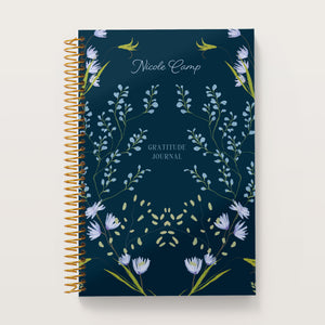 
                  
                    Flower Frame Blue cover on a 6×9 Posy gratitude journal
                  
                