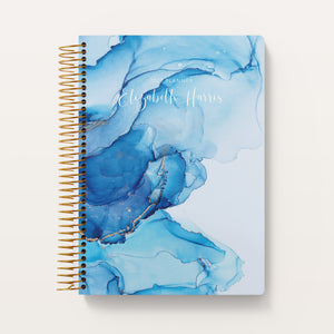 
                  
                    Blue Abstract Ink cover on a 6×9 Posy planner
                  
                