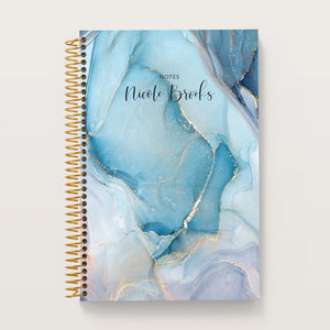 
                  
                    Aqua Gold Abstract Ink cover on a 6×9 Posy notebook
                  
                