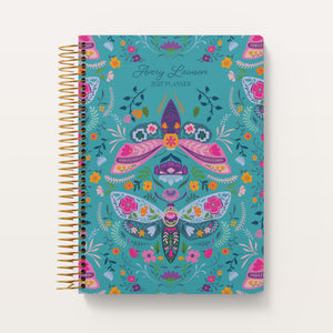 
                  
                    Meadow Daybreak Wings cover on a 6×9 Posy planner
                  
                