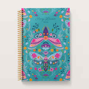 
                  
                    Meadow Daybreak Wings cover on a 6×9 Posy notebook
                  
                