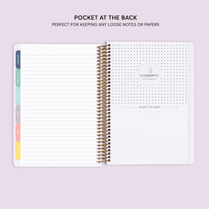 
                  
                    Storage pocket at the back of a 6×9 Posy self-care planner
                  
                
