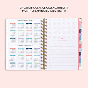 
                  
                    Two-year-at-a-glance reference pages in a 6×9 hardcover Posy planner
                  
                