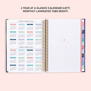 
                  
                    Two-year-at-a-glance reference pages in a 6×9 hardcover Posy planner
                  
                
