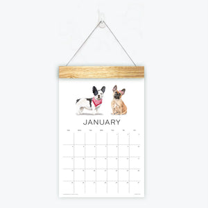
                  
                    Loyal Companions wall calendar with dog illustrations
                  
                