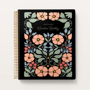 
                  
                    Secret Garden Midnight Garden cover on an 8.5×11 Posy planner
                  
                