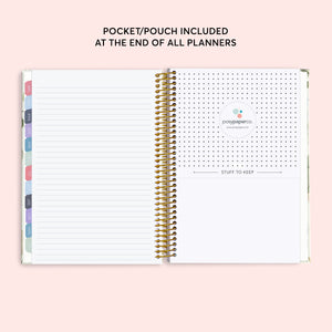 
                  
                    Lined notes page beside the planner's back pocket.
                  
                