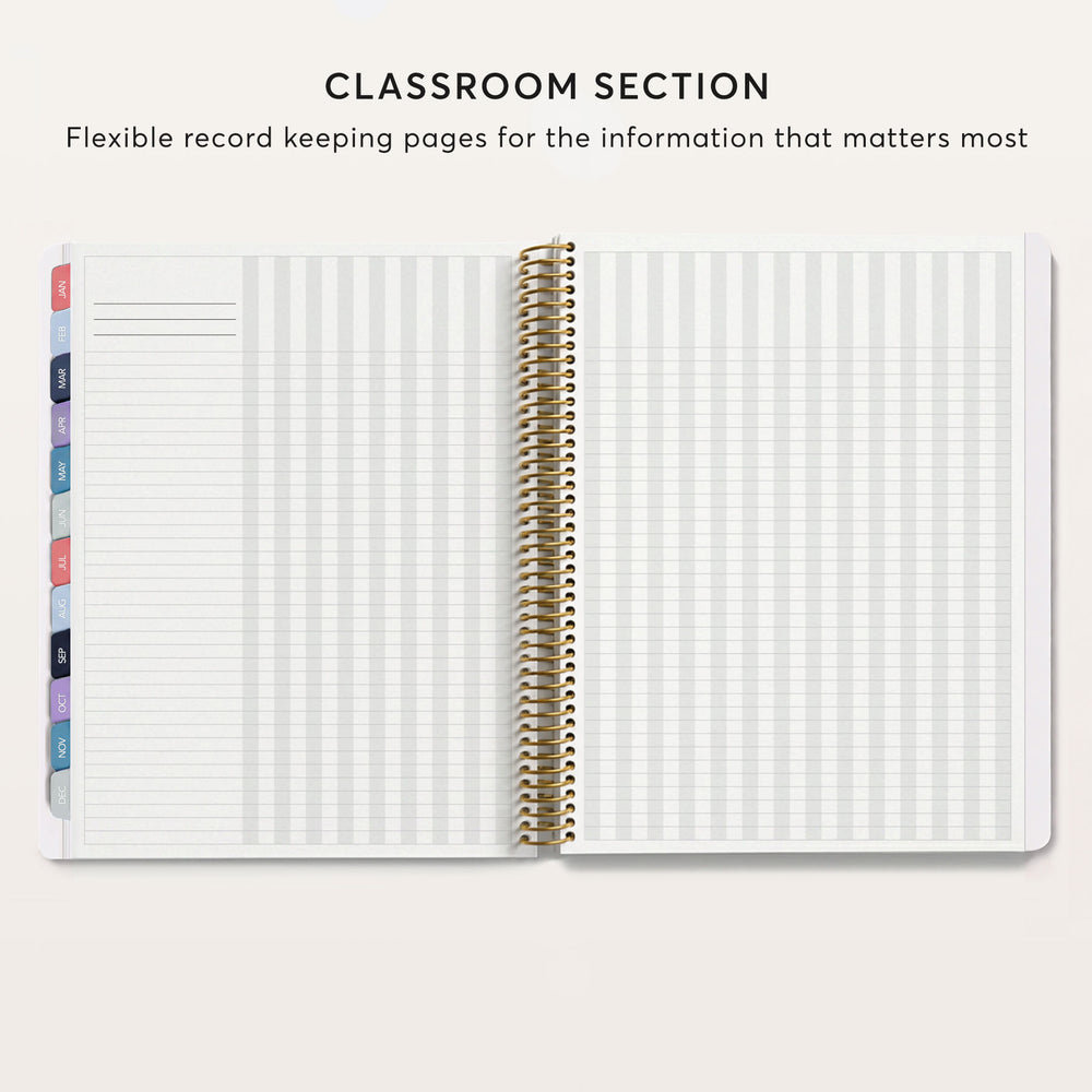 
                  
                    an open spiral-bound notebook with blank pages, labeled as a classroom section.
                  
                
