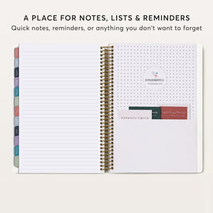 
                  
                    Planner back pocket holding cards beside a lined notes page.
                  
                