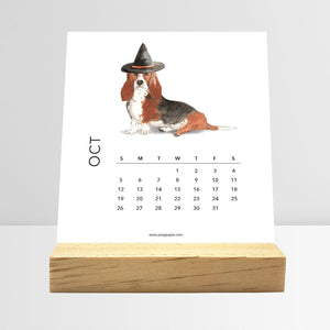 
                  
                    October Dog Breeds desk calendar card with a dog illustration
                  
                