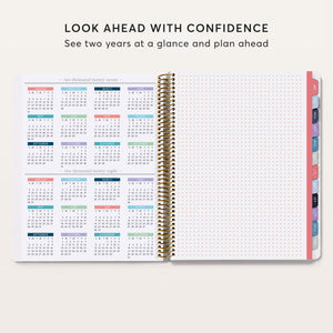 
                  
                    Student planner year-at-a-glance calendar beside a dot-grid notes page.
                  
                