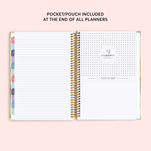 
                  
                    Lined notes page beside the planner's back pocket.
                  
                