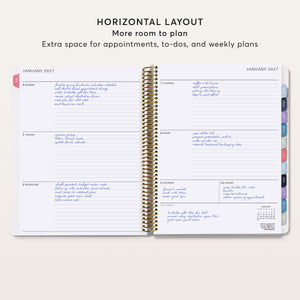 
                  
                    Open 8.5×11 weekly planner showing a January 2027 horizontal layout with room for appointments and to-do lists.
                  
                