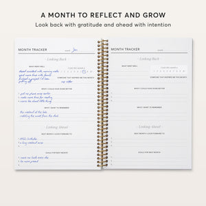 
                  
                    Monthly reflection spread with prompts for looking back and planning ahead.
                  
                