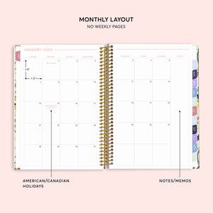 
                  
                    Two-page monthly calendar spread in a 6×9 hardcover Posy planner
                  
                