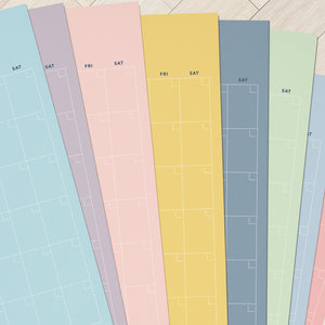 
                  
                    Fan of pastel-colored undated wall calendar sheets
                  
                