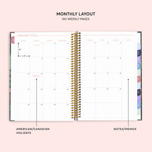 
                  
                    Two-page monthly calendar spread in a 6×9 hardcover Posy planner
                  
                