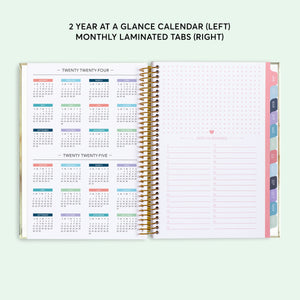 
                  
                    Two-year-at-a-glance reference pages in a 6×9 hardcover Posy planner
                  
                