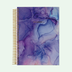 
                  
                    6×9 hardcover student planner with a Purple Flowing Ink cover and gold coil binding.
                  
                
