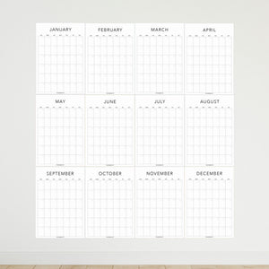 
                  
                    White undated wall calendar showing all twelve monthly sheets
                  
                