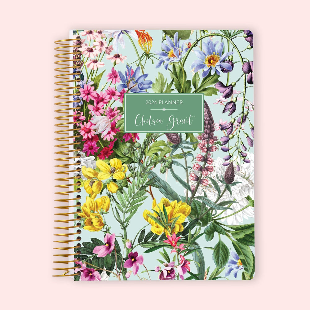 https://posypaper.com/cdn/shop/products/6x9-Weekly-Planner-Colorful-Florals-Green-Cover-310973_1000x1000.jpg?v=1700761377
