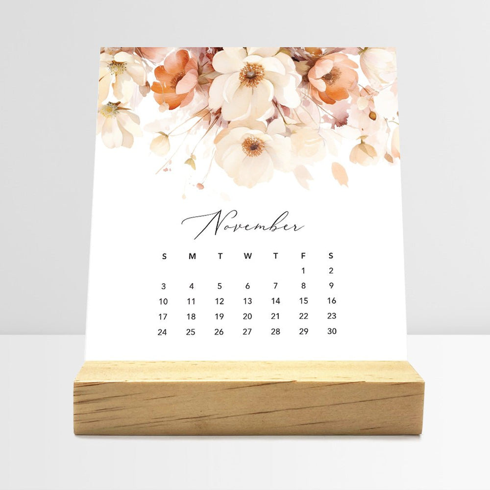 
                  
                    Posy Paper Co. 2024 desk calendar with flirty florals design displaying November dates.
                  
                