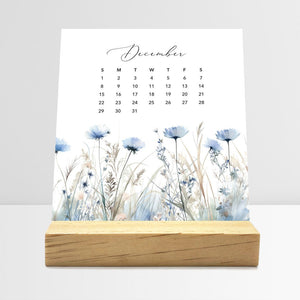 
                  
                    Posy Paper Co. 2024 desk calendar with meadow floral design displaying December dates.
                  
                