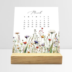 
                  
                    March Meadow Floral desk calendar card with watercolor flowers in a wooden stand.
                  
                